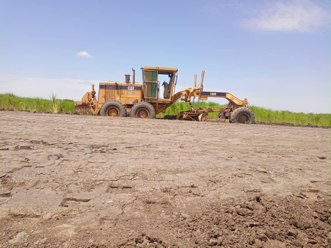 CAT grader on road