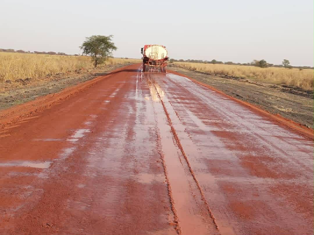 Road watering and compaction